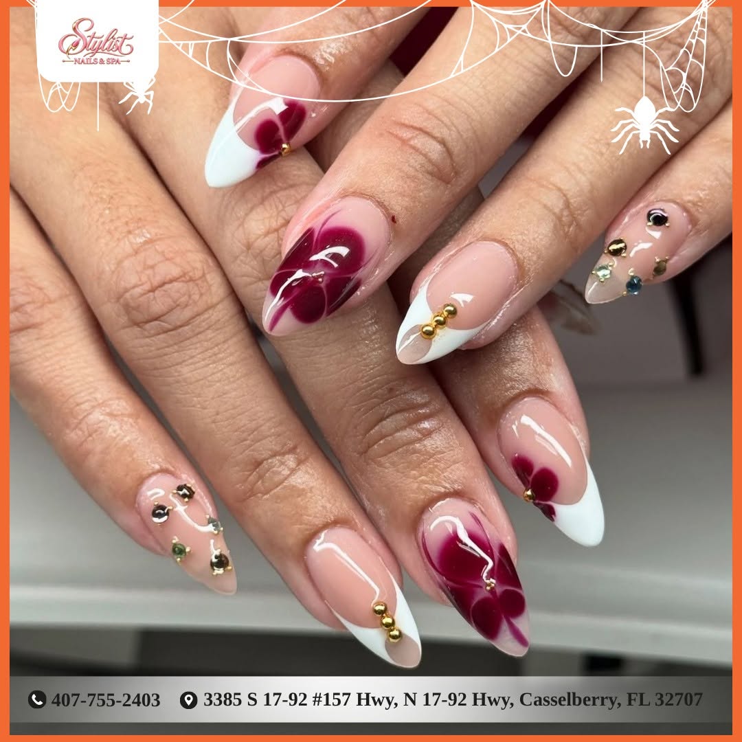 Burgundy floral French manicure with gold beads