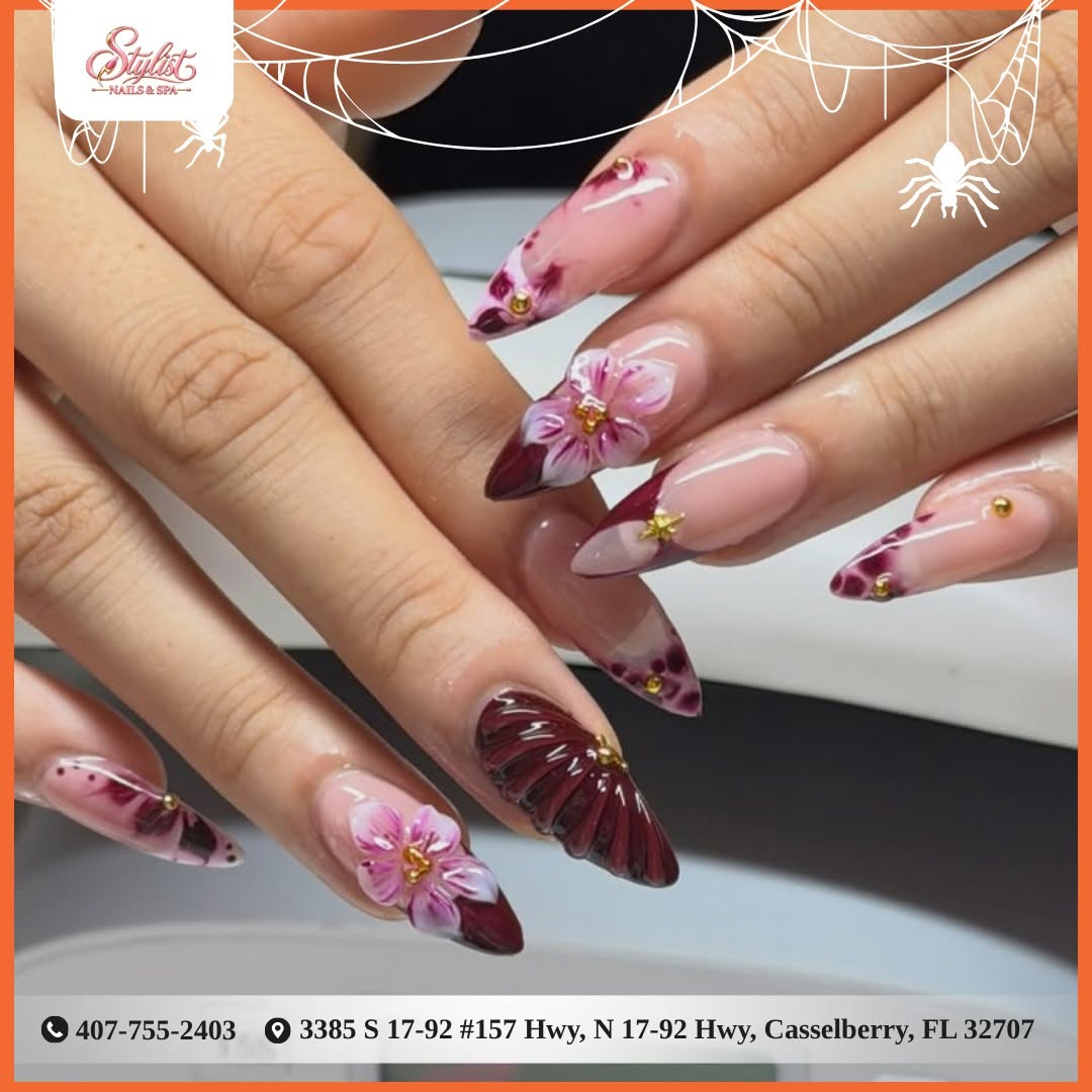 3D floral nail art with gold studs