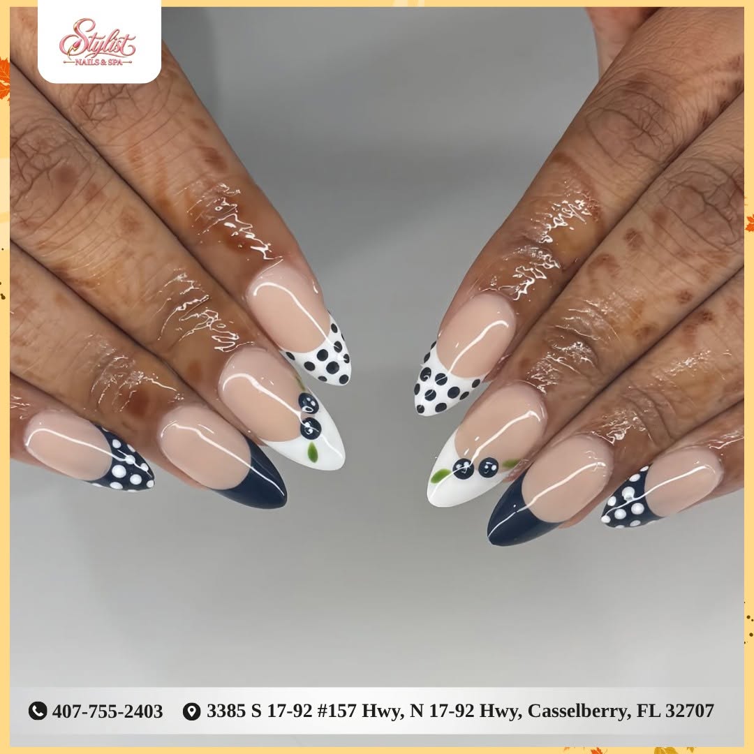 Nude French nails with blueberry and polka-dot art